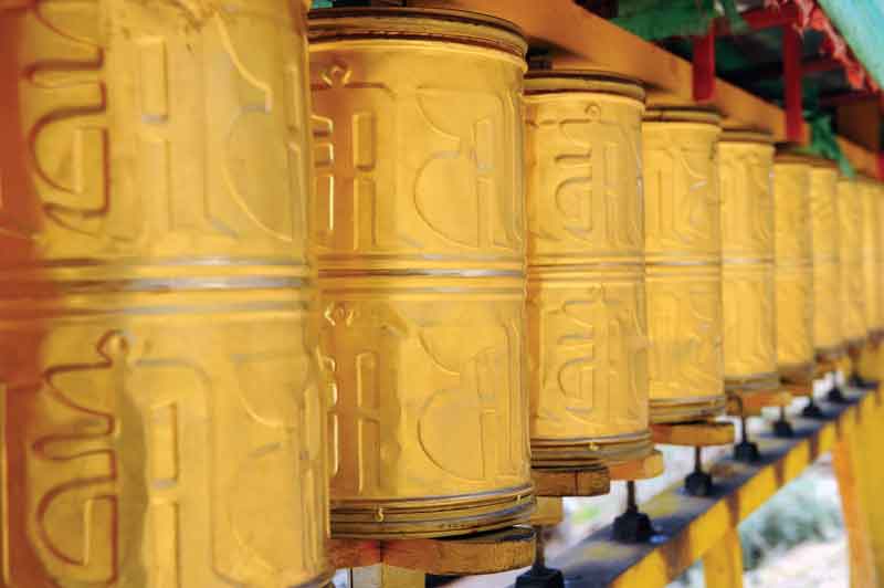 Prayers wheels contain scrolls that are repeatedly inscribed with mantras.