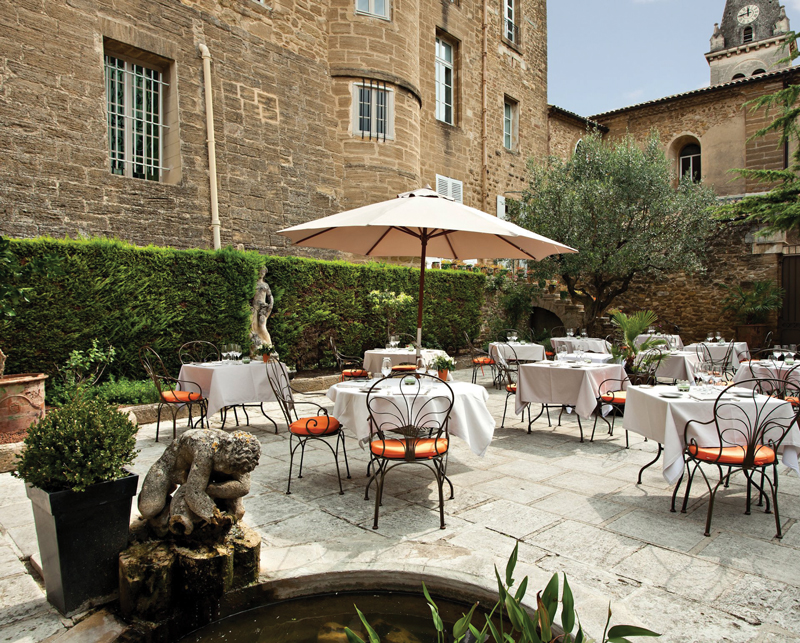 Amura,Agde,AmuraWorld,Amura Yachts,Chateau de Rochegude, The terrace is surrounded by olive trees.